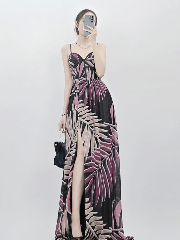 Đầm maxi 2 dây Crystall Doll cúp ngực xẻ tà in lá
