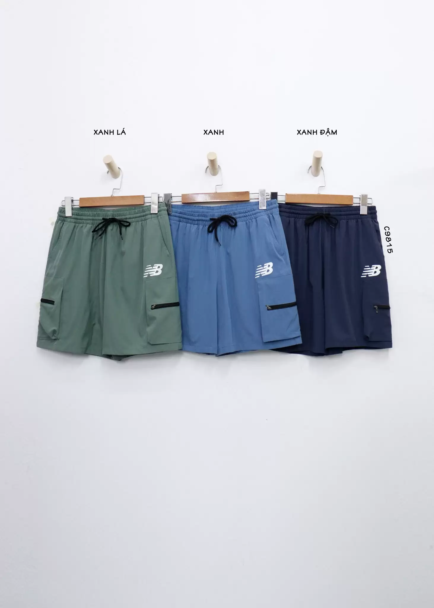 Quần short dù nam NB lưng thun 2 túi hông dây kéo