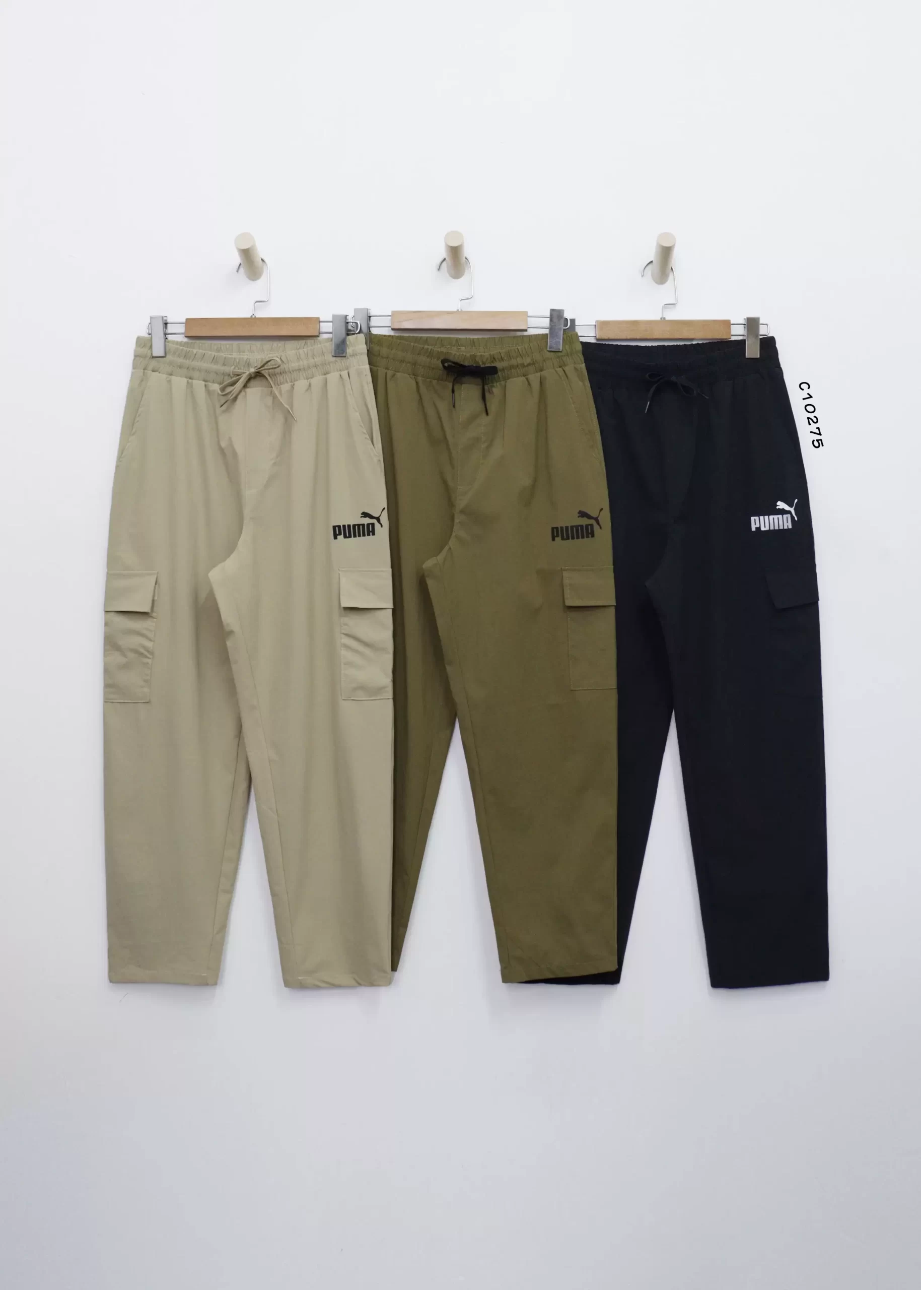 Quần dù Puma lưng thun 2 túi xéo in puma