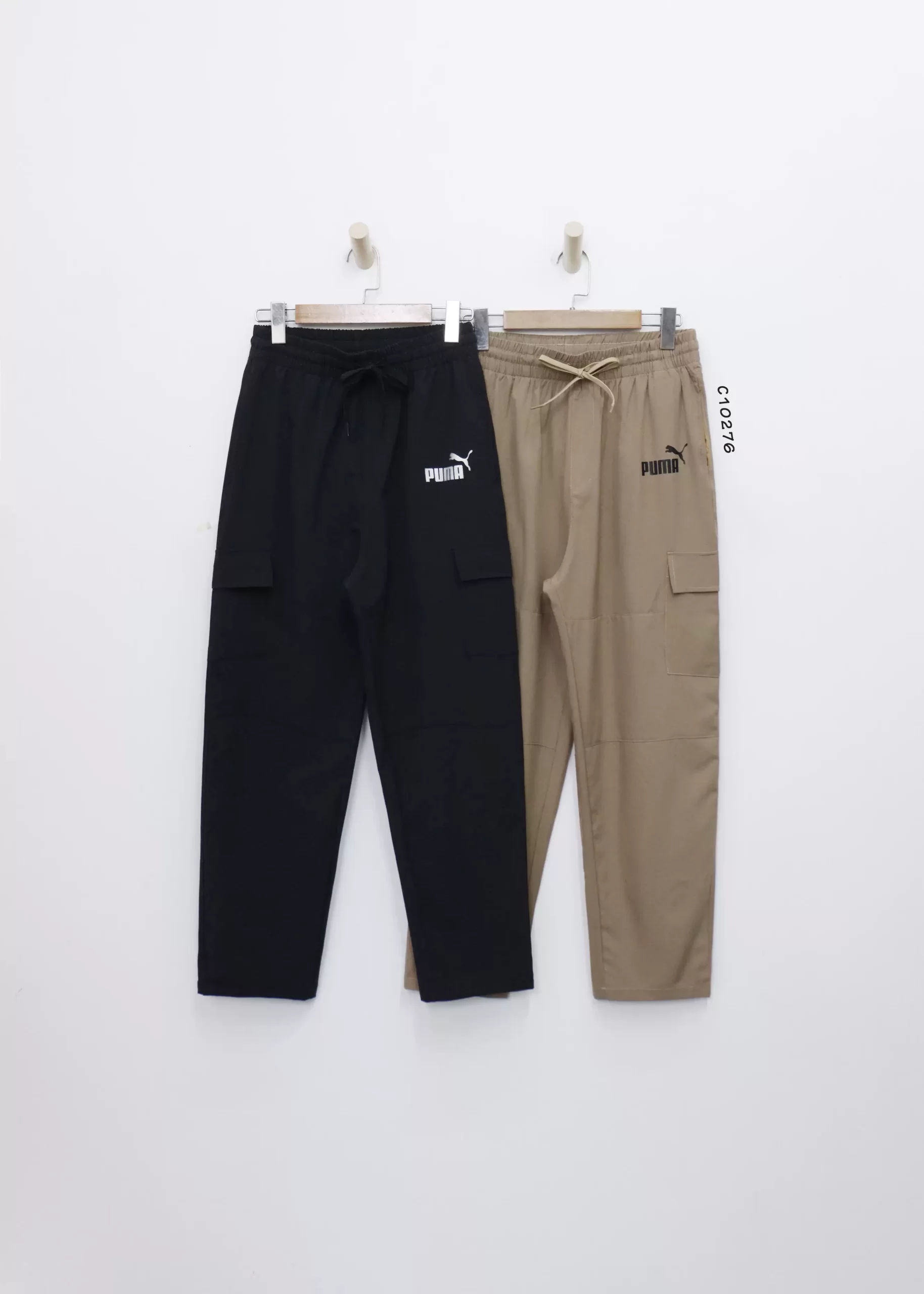 Quần dù Puma lưng thun 2 túi xéo in puma trắng